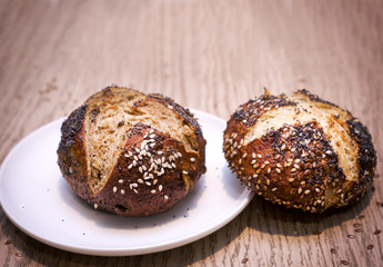 Homemade bread: Brezel rolls with seeds