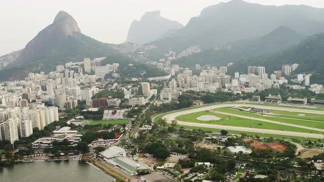 Aerial video of cityscape, landscape, and sporting complex - Rio de Janeiro.