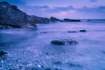 Blur water effect ocean at sunset