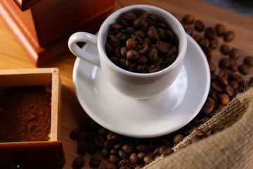 manual coffee grinder ,beans and cup
