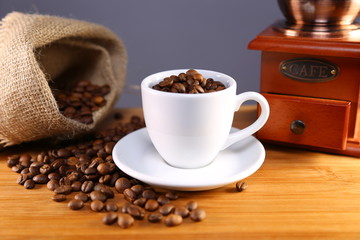 manual coffee grinder ,beans and cup