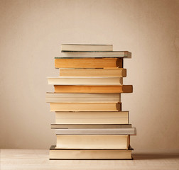 A stack of books with vintage background