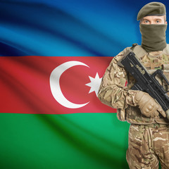 Soldier with machine gun and flag on background - Azerbaijan