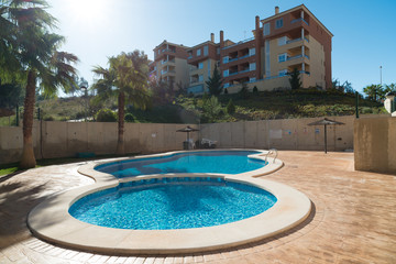 View of the swimming pool in the urbanization Altorreal. Region of Murcia. Spain