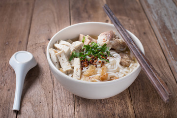 Vietnamese Noodle Soup with chilli on top.