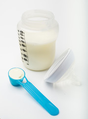 Powdered milk in baby bottle