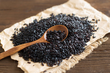 Black rice with a spoon