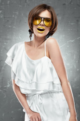 Fashion model woman, yellow sunglasses