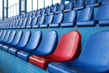Obraz premium blue seats at stadium