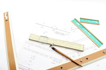 Vintage architecture plans, note writing with pen in the stencil.