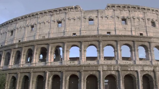Low angle pan of north wall of Colosseum