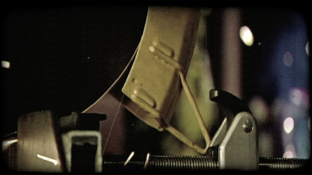 Men weld and cut in warehouse. Vintage stylized video clip.