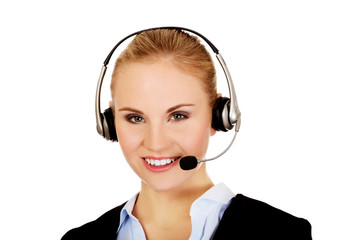 Smiling phone operator in headphones