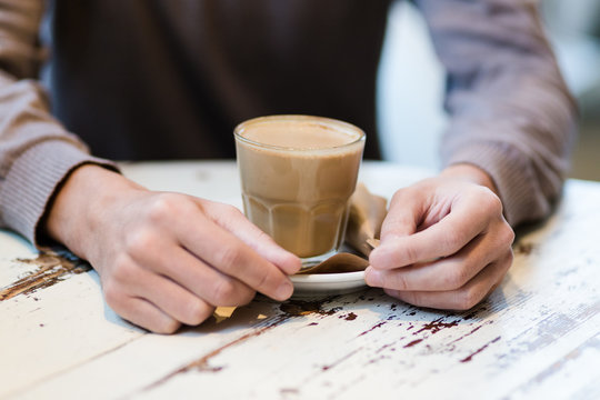male hands with cup of  coffee