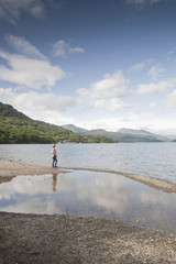 Fototapeta na wymiar Woman at Loch Lomond; Scotland; UK
