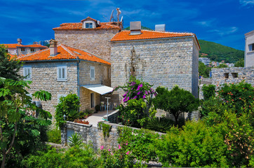 Old houses, windows and tiled roof. Budva, Montenegro