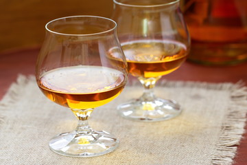 Glass of cognac on the table