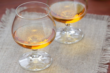 Glass of cognac on the table