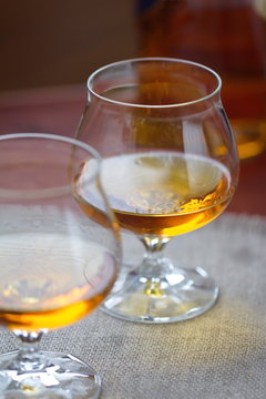 Glass of cognac on the table