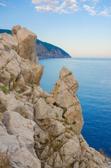 Rock over the sea, the evening