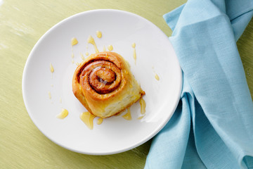 fresh cinnamon buns on plate
