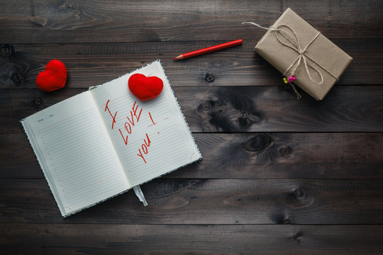 Phrase about love written in notebook