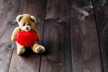 Cute toy bear with red heart