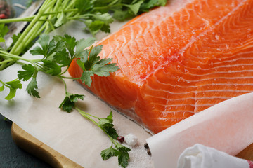 cooking raw salmon and fresh greens