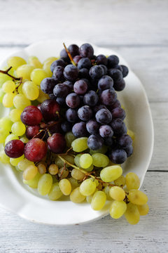 mix grapes on white plate
