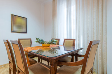 Dining room interior , Table with chairs in bright dining room