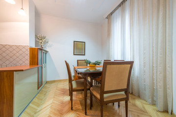 Dining room interior , Table with chairs in bright dining room