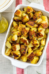Roasted fried potatoes with garlic, rosemary