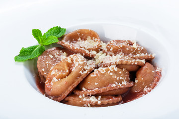 Red beetroot ravioli with blue cheese filling