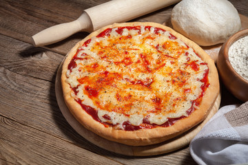 Delicious italian pizza served on wooden board