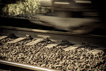 Obraz premium Railway. Very quickly, train rides, his image is blurred. 