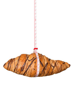 Croissant wrapped in measuring tape