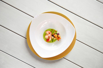 Prawn dish on a white table