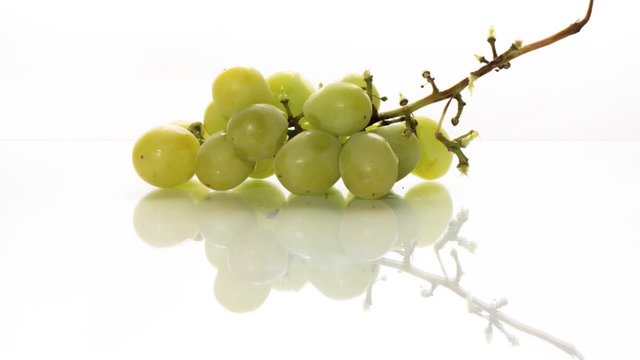 Fresh Green grapes on white background with shadow 