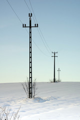 Electricity poles in the snow in Hungary