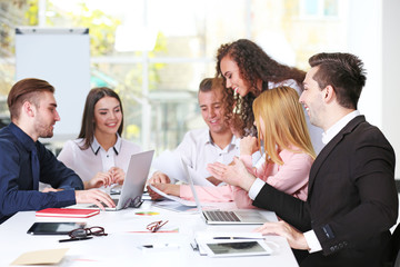 Young business people discussing a new project in a conference room