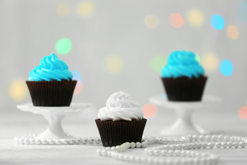 Chocolate cupcakes on blurred background