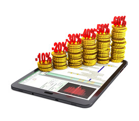 Tablet pc and columns of gold coins.