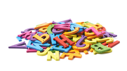 Pile of colorful wooden letters isolated