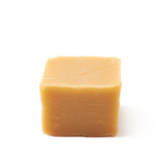 Almond butter toffee cube isolated