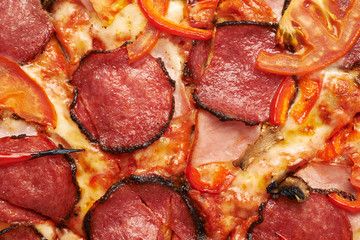 Close-up pepperoni pizza fragment