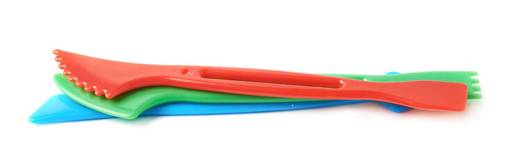 Pile of three plastic chisels isolated