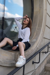 model posing on a round window