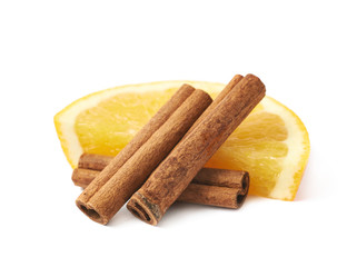 Orange slice and cinnamon isolated