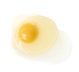Cracked raw chicken egg isolated