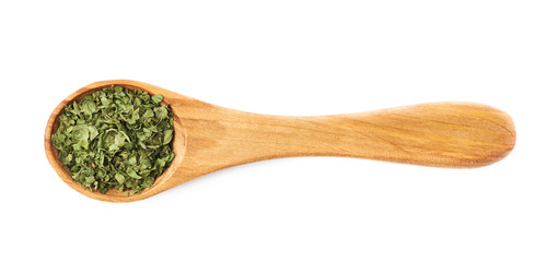 Spoon full of coriander isolated